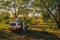4x4 in lush bush with satellite dish